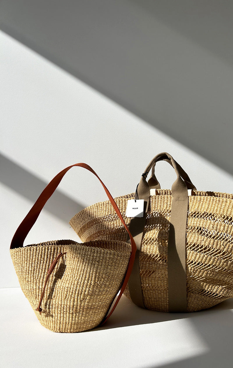 Sculptural Muun Straw bag with rust cotton handle
