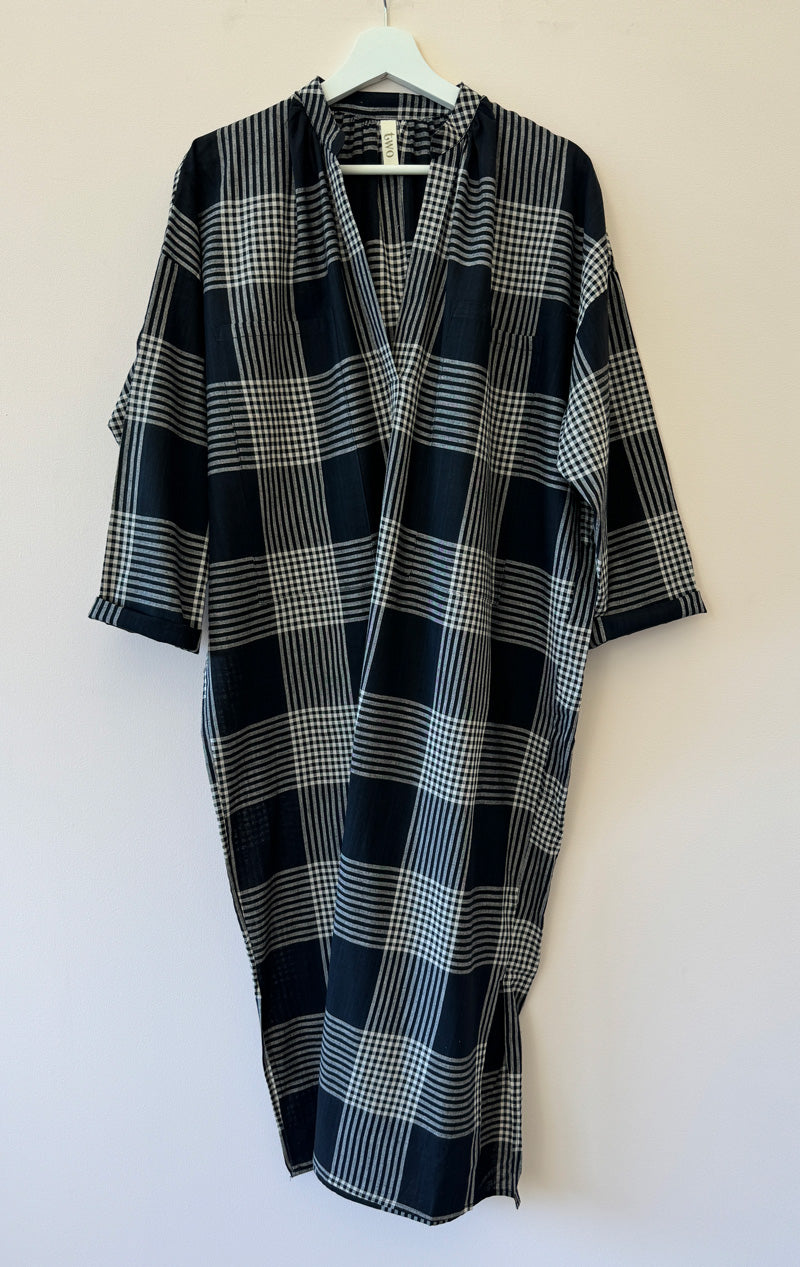 black and cream plaid cotton; not sheer in a two pocket, long sleeve caftan