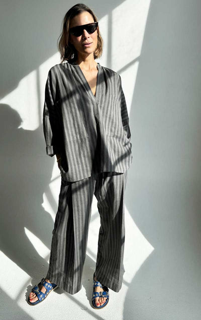 Wide leg pleated pant with wide elastic waistband in Black and Grey stripes