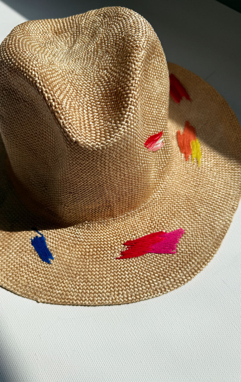Natural hat with colorful stitching