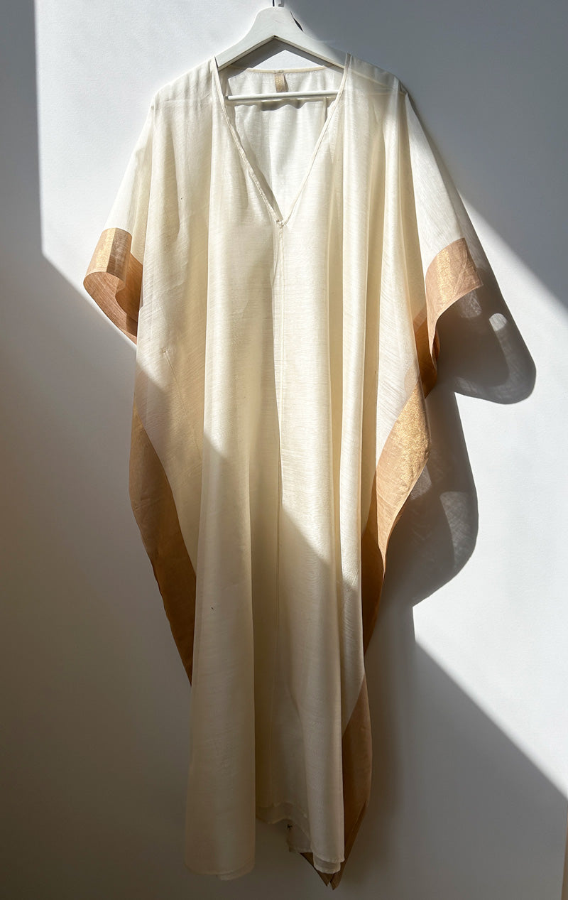 White caftan with gold border