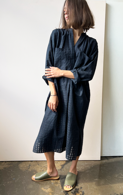 long sleeve, two pocket caftan dress in black khadi grid cotton fabric