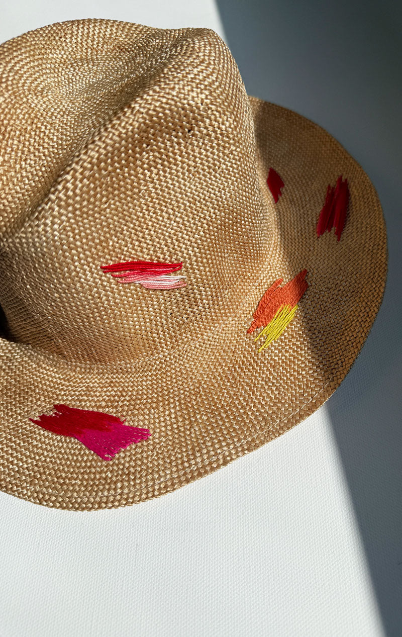 Natural hat with colorful stitching