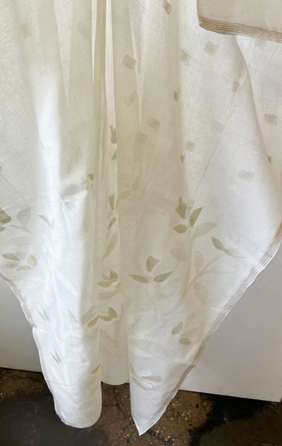 white caftan with floral motif