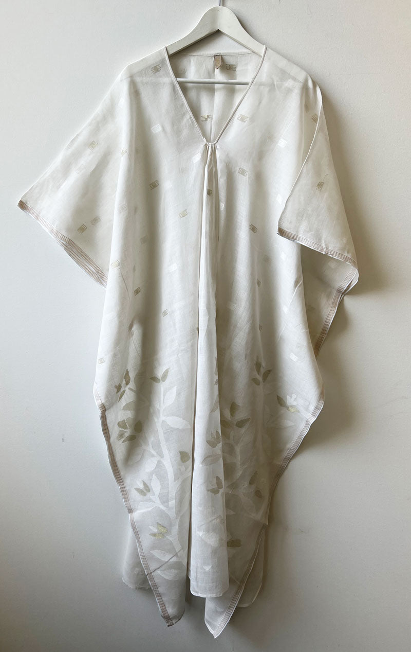 white caftan with floral motif